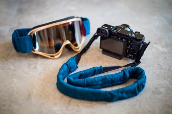 Camera strap and goggle strap covers for Burn