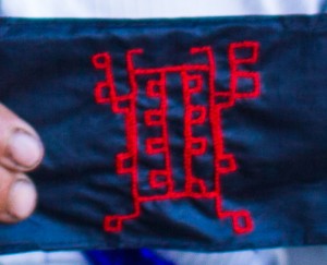 Red Dao women embroidery space invader