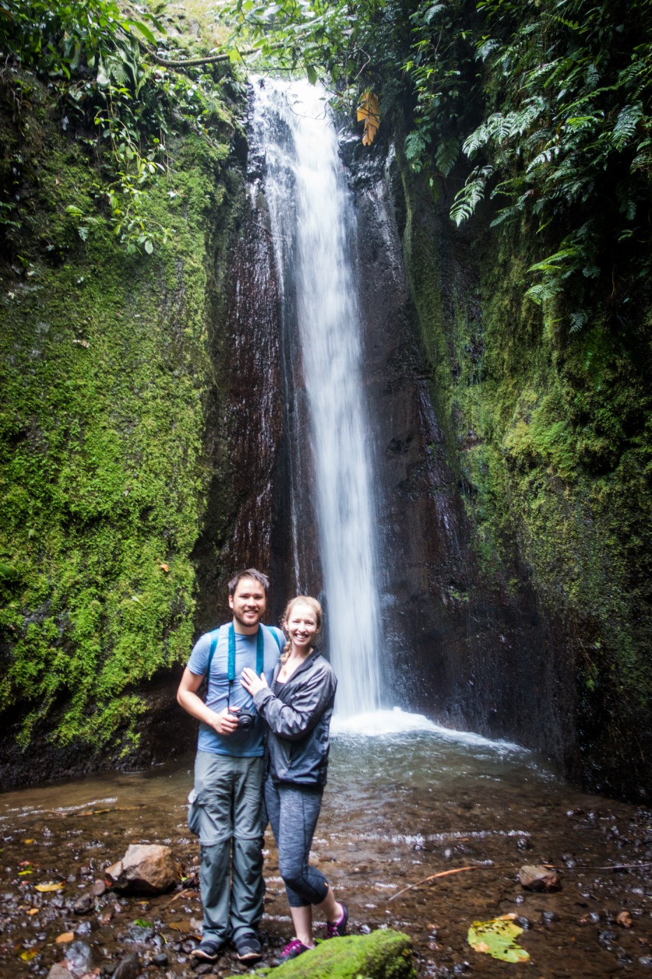 Diana Southern and Ian Norman at a waterfall on Sky Walk hanging bridges tour with Sky Adventures Arenal, Costa Rica