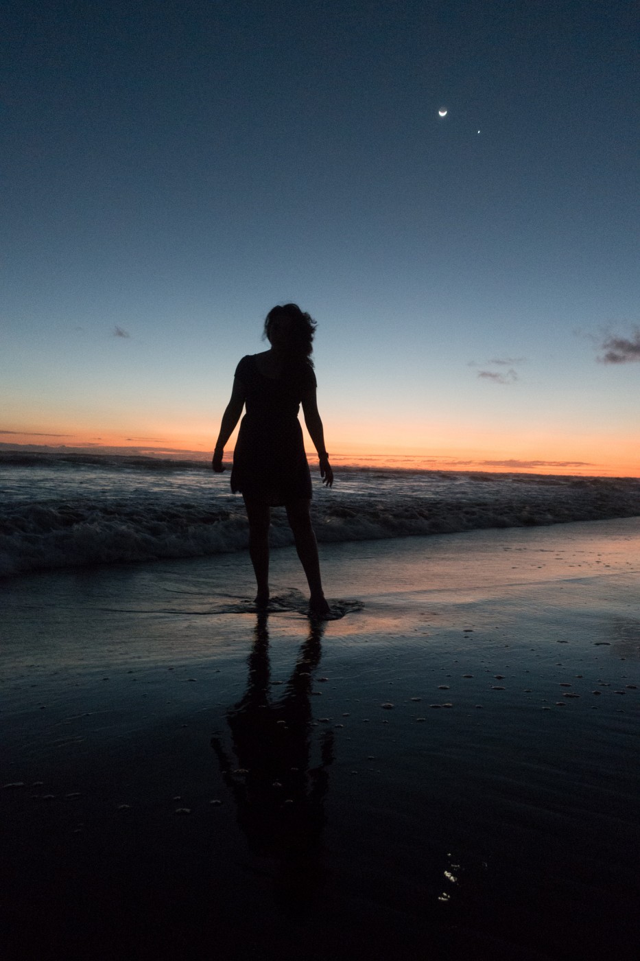 Sony RX-100 III photography sample: woman's silhouette on beach at sunset