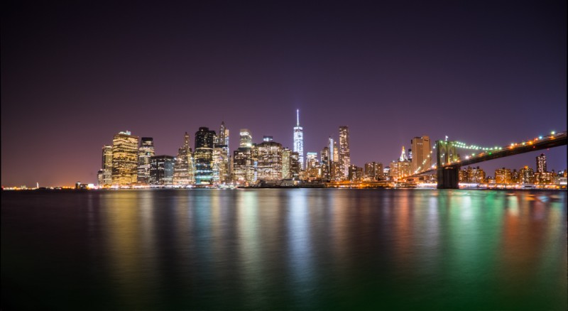 New York City skyline at night photo by Ian Norman