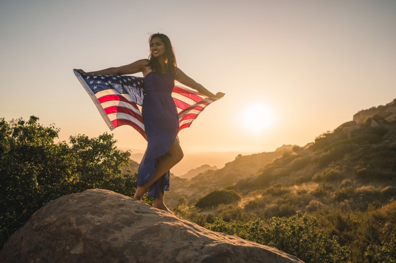 stunning travel portraits: patriotic sunset flag shot