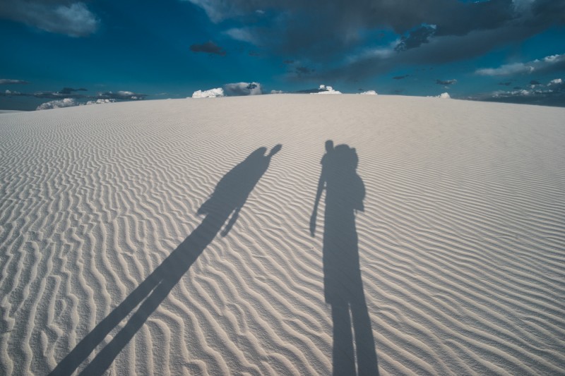couple's shadow at White Sands National Monument, New Mexico